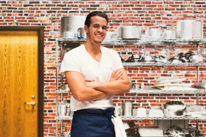 Chef With Kitchen Equipment